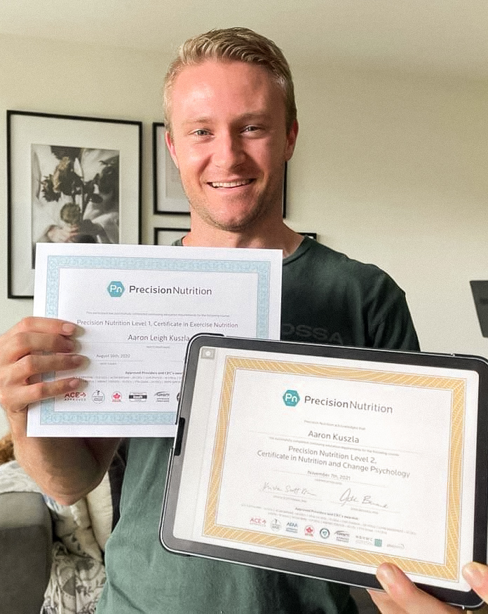 Aaron holding PN certificates